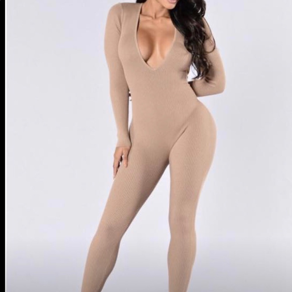 Beige jumpsuit with low v neck